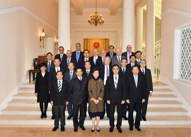 The Chief Executive, Mrs Carrie Lam (first row, centre); the Secretary for Education, Mr Kevin Yeung (first row, second right); the Chairman of the University Grants Committee (UGC), Mr Carlson Tong (first row, second left); and members of the UGC are pictured at Government House today (January 12)
