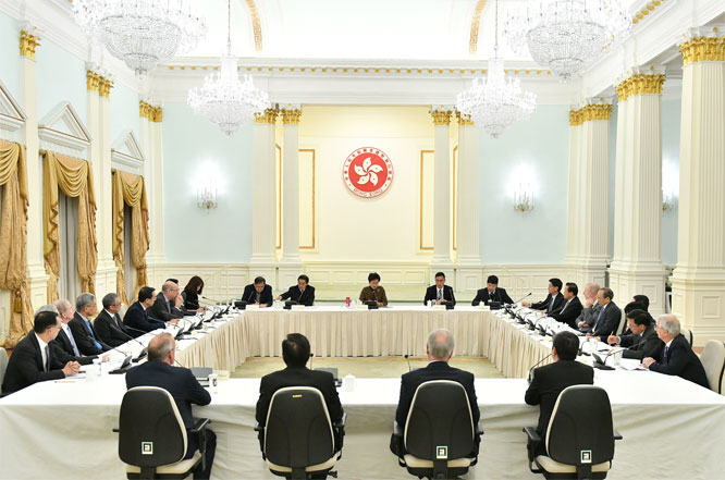 The Chief Executive, Mrs Carrie Lam (back row, centre), met members of the University Grants Committee (UGC) at Government House today (January 12) to exchange views on issues including UGC's efforts in recent years in grooming high-calibre talent, promoting research work and strengthening governance in the funded institutions