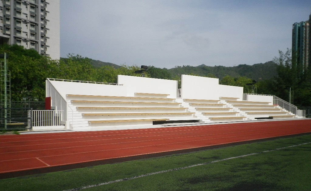 Extension of spectator stand at outdoor sports ground, LU
